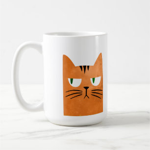 Eine orange Katze mit einer Haltung Kaffeetasse