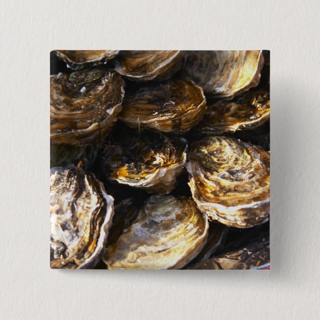 Eine Platte Austern. Button (Vorderseite)