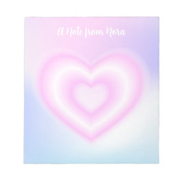 Eine rosa neonale Herzform Notizblock