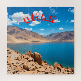 Eine ruhige, türkisfarbene Bucht an der Omani Puzzle
