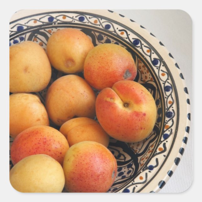 Eine Schüssel mit Aprikosen/Marillen aus dem Mitte Quadratischer Aufkleber (Vorderseite)