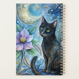 Eine schwarze Katze mit auffälligen gelben Augen Planer