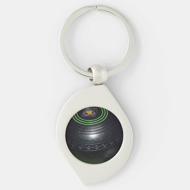 eine schwarze Rasenschale, Schlüsselanhänger (Vorderseite)