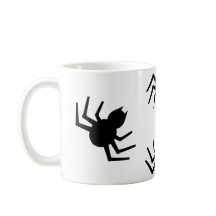 Eine schwarze Spinnenne-Tasse