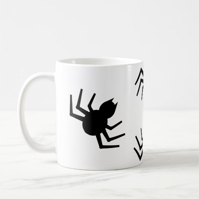 Eine schwarze Spinnenne-Tasse Kaffeetasse (Links)