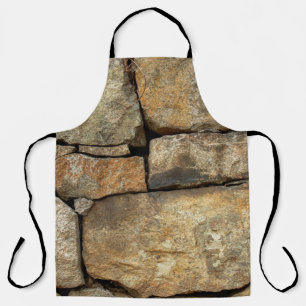 Eine Steinmauer aus Kopfsteinpflaster Hintergrundt Schürze