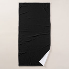Eine strukturierte schwarze Oberfläche mit feinem  Badhandtuch Set