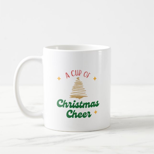 Eine Tasse Weihnachtsjubeln mit Goldbaum (Links)