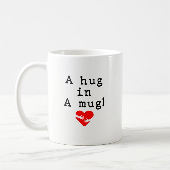 Eine Umarmung in einer Tasse! Kaffeetasse (Links)