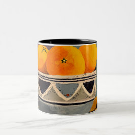 Eine wunderschöne Tasse mit Orangenmalerei