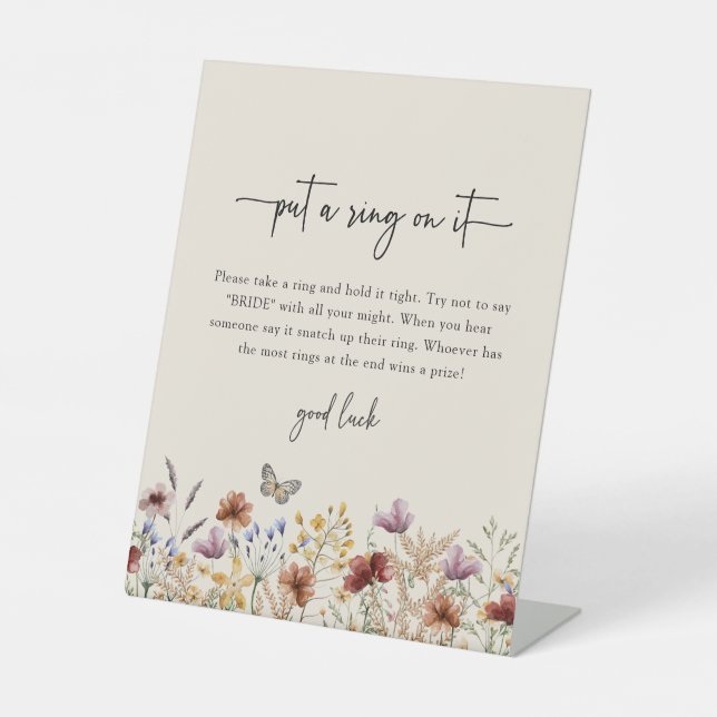 Einen Ring drauf setzen Sockelschild (Vorderseite)