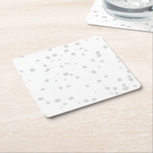 einen weißen Hintergrund mit vielen kleinen Punkte Rechteckiger Pappuntersetzer