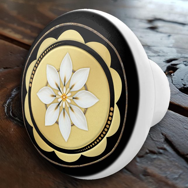 Einfache Elegante Schwarze Gold Keramikknauf (An elegant ceramic door knob featuring a simple floral design on black and gold.)