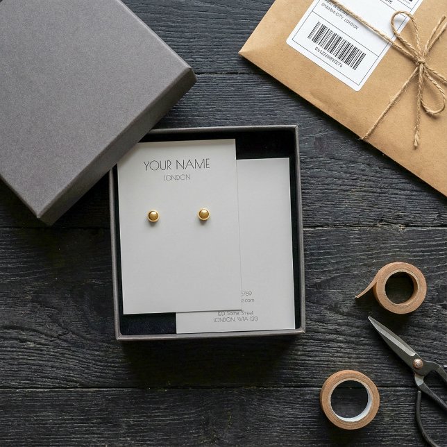 Einfache, hellgraue Ohrring-Grafikkarte (Simple light grey earring display card.)