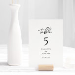 Einfache Minimalistische Hochzeitskarte für Tischn Tischnummer<br><div class="desc">Diese minimalistische Hochzeitskarte eignet sich perfekt für Ihre moderne Hochzeit. Dieses Design ist mit schwarzem,  einfachem Drehbuch auf einem neutralen,  hellweißen Hintergrund ausgestattet,  um Ihre klassische traditionelle Hochzeit oder minimalistische Hochzeit im Frühling,  Sommer,  Herbst oder Winter. Gerne stehen wir Ihnen für Fragen zu diesem Design zur Verfügung.</div>