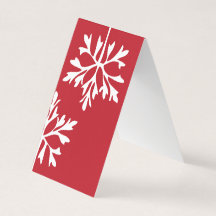 Einfache Schneeflocke auf rotem Hintergrund