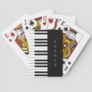 Einfache und elegante Piano-Tastatur in Schwarz un Spielkarten