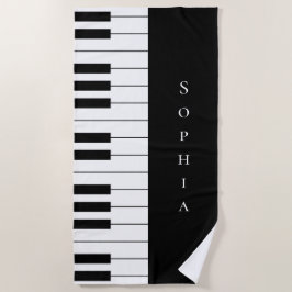 Einfache und elegante Piano-Tastatur in Schwarz un Strandtuch