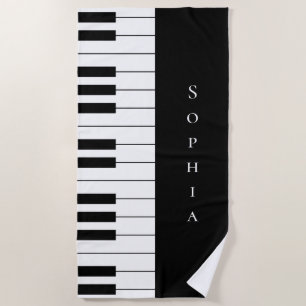 Einfache und elegante Piano-Tastatur in Schwarz un Strandtuch