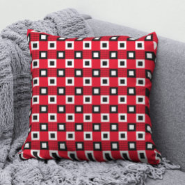 Einfaches geometrisches Schwarzweißmuster auf Rot Kissen