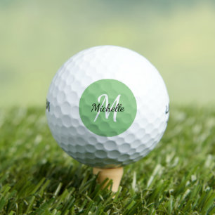 Einfaches grün monogrammiertes Design Golfball