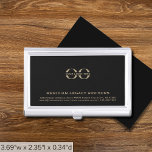 Einfaches Schwarzes Logo Visitenkarten Dose<br><div class="desc">Erhöhen Sie Ihr Netzwerkspiel mit diesem einfachen, schlanken und beruflichen Visitenkartengehäuse. Der elegante Hintergrund mit Ihrem Logo, Firmennamen, Adresse, Kontaktinformationen und Website in klassischer goldener Typografie in den unteren Drittel fügen eine Touch der Raffinesse zu Ihren geschäftlichen Interaktionen hinzu. Bleibe organisiert und mache einen bleibenden Eindruck mit diesem stilvollen Accessoire....</div>