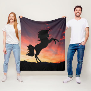 Einhornzucht in einem herrlichen Sonnenuntergang Fleecedecke