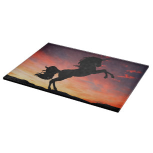 Einhornzucht in einem herrlichen Sonnenuntergang Schneidebrett