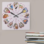 Einmal in einer Zeit von 12 Herz geformte Fotos ro Quadratische Wanduhr<br><div class="desc">Erstellen Sie Ihre eigene Multi-Foto-Uhr, um Ihre Geschichte zu erzählen - die Mitte der Uhr wird mit "Once upon a time" in handgeschriebener Typografie geschrieben. Verwenden Sie die Bildvorlage, um 12 Ihrer bevorzugten Fotos hinzuzufügen, die in herzförmigen Rahmen angezeigt werden. Das Design verwendet porträtierte vertikale Fotos für alle Zahlen außer...</div>