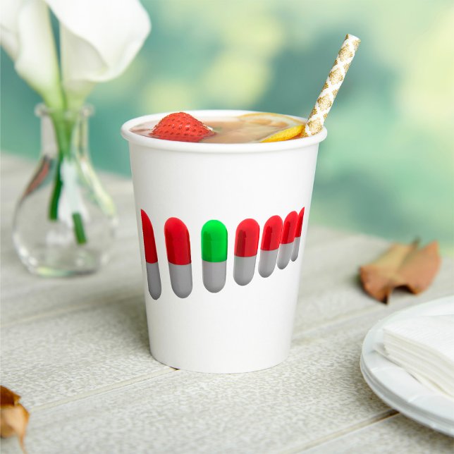 Einzigartige grüne Pille unter den roten Kapseln Pappbecher (Von Creator hochgeladen)