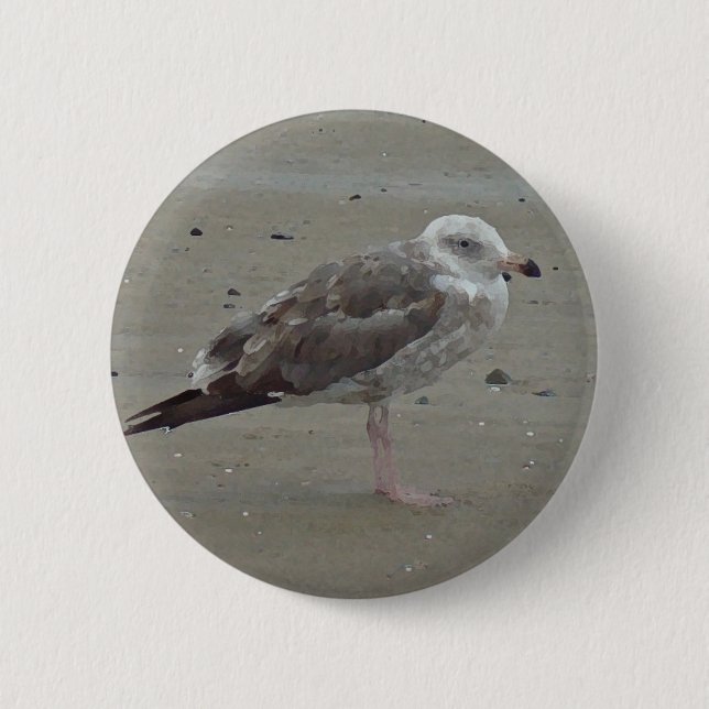 Einzigartige Seagull steht allein auf dem Sand Oce Button (Vorderseite)