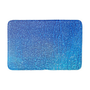 Eis auf blauem metallischem Hintergrund Badematte