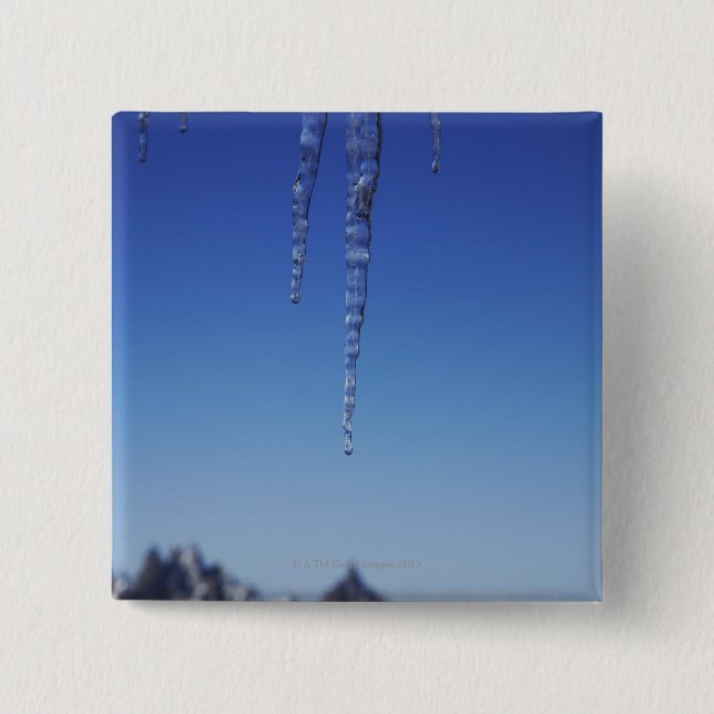 Eiszapfen und schneebedeckte Berge Button (Vorderseite)