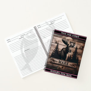 Elche Schnitzereien auf Holz bei Sonnenuntergang Notizbuch