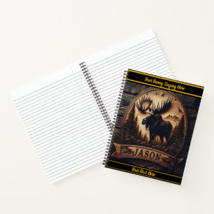 Elchskulptur in bewaldeten Bergen Notizbuch