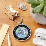 Elegant 34th Opal Wedding Anniversary Celebration Schlüsselanhänger<br><div class="desc">Celebrate their 34th opal wedding anniversary with this stylish commemorative keychain! Elegant lettering with hexagonal confetti on an iridescent opal background add a memorable touch for this special occasion and extraordinary milestone. Customize with couple's names, anniversary date, and up to 2 lines of messaging. Design © W.H. Sim. See more...</div>