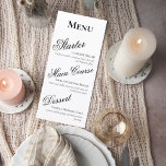 Elegant Black and White Wedding Menu Card Menükarte<br><div class="desc">Elevate your reception tables with this elegant black and white wedding menu sign. Designed with a refined serif header and flowing script course titles, this minimalist layout blends timeless romance with modern sophistication. The bold “Menu” heading creates a clean focal point, while the graceful script for each course adds a...</div>