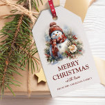 Elegant Floral Christmas Snowman Geschenkanhänger<br><div class="desc">Fügen Sie Ihrem Weihnachtsgeschenk in dieser Saison eine besondere Touch mit unseren eleganten Weihnachtsschneemanns in Rot und Weiß hinzu. Diese atemberaubenden Geschenketiker verfügen über einen wunderschön gestalteten Aquarell-Schneemann, der in Typografie-Schriftart "Frohe Weihnachten" geschrieben hat. Diese Geschenketiketten sind auch vollständig anpassbar! Fügen Sie eine persönliche Touch hinzu, indem Sie einen Familiennamen...</div>