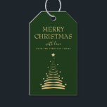 Elegant Gold Green Christmas Tree Custom Geschenkanhänger<br><div class="desc">Fügen Sie eine besondere Touch zu Ihrem Weihnachtsgeschenk in dieser Saison mit unseren eleganten Gold und grünen Weihnachtsbaum Custom Geschenketiketten hinzu. Diese atemberaubenden Geschenketiketten verfügen über einen wunderschön gestalteten vergoldeten Urlaubshaum auf grünem Hintergrund, der in elegantem Typografie-Schriftart "Frohe Weihnachten" geschrieben ist. Aber das ist noch nicht alles - diese Geschenketiketten...</div>