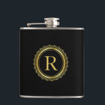 Elegant Golden Medallion Monogram Flachmann<br><div class="desc">Ein elegantes goldenes Medaillon und ein individuelles Monogramm,  das Sie mit Ihrem gewünschten Initial personalisieren können. Hier in schwarz dargestellt,  kann der schwarze Hintergrund in die Farbe Ihrer Wahl geändert werden. Macht eine großartige Geschenkentscheidung für Geburtstage,  Vatertag,  Trauzeuge,  Weihnachten und mehr.</div>