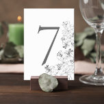 Elegant Lily Floral Wedding Table Number Card Tischnummer<br><div class="desc">Add a graceful finishing touch to your reception tables with this elegant floral wedding table number card. Featuring delicate lily line-art illustrations along the edge, the design blends timeless botanical beauty with a clean, minimalist layout that feels both modern and sophisticated. The bold table number stands prominently at the center,...</div>