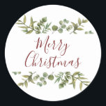 Elegant Merry Christmas Script Greenery Runder Aufkleber<br><div class="desc">Watercolor grüne Rahmen elegante Drehbuch Merry Weihnachtstypografie auf diesen eleganten Urlaubsticker. Entwickelt von Thisisnotme©</div>