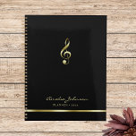Elegant Treble Clef Music 2025 Yearly Planner Planer<br><div class="desc">Dieser schlichte und elegante schwarze Jahresplaner zeichnet sich durch einen Treppenschnitt in Imitat Gold aus. Ideal für Musiklehrer,  Musikschulen,  Musiker,  Musikliebhaber und vieles mehr. Passen Sie es mit Ihren eigenen Daten an und nutzen Sie das Editierwerkzeug,  um weitere Anpassungen,  wie z.B. die Größe und Platzierung des Schriftartes,  vorzunehmen.</div>