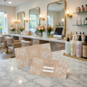 Elegante beige Geschäftskarte mit botanischem Verw Visitenkarte