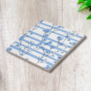 Elegante blaue Blüten und gestreiftes Blumenmuster Fliese