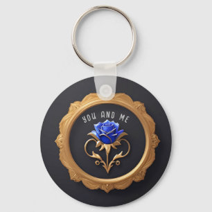 Elegante blaue Rose im goldenen Rahmen mit aufwend Schlüsselanhänger