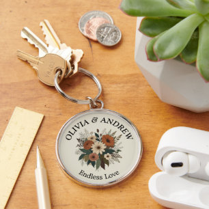Elegante Blumenakzente und Farbpalette Schlüsselanhänger