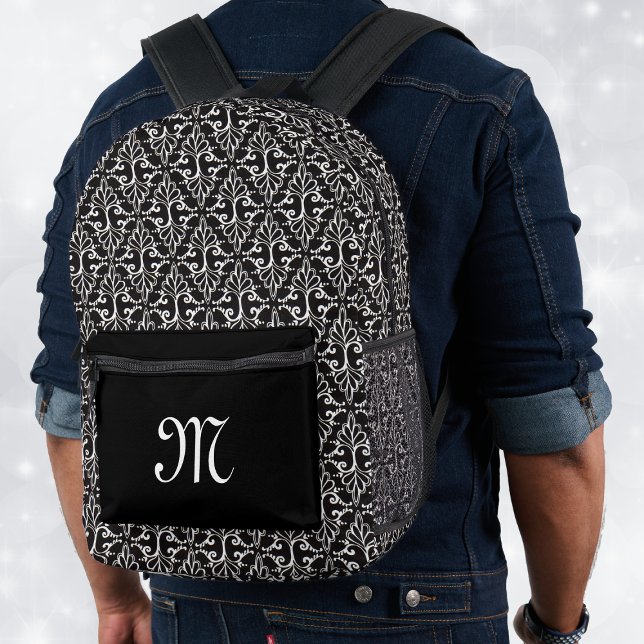 Elegante Damask Muster weiße Bildlaufwerke auf sch Bedruckter Rucksack (Classic damask pattern on a packback done in black and white with personalized front black pocket.)