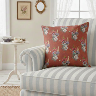 Elegante farbenfrohe Wildblumen auf staubigem Rot Kissen