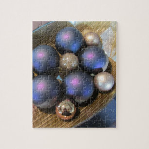 Elegante Glasbälle in einer goldenen Schale Puzzle